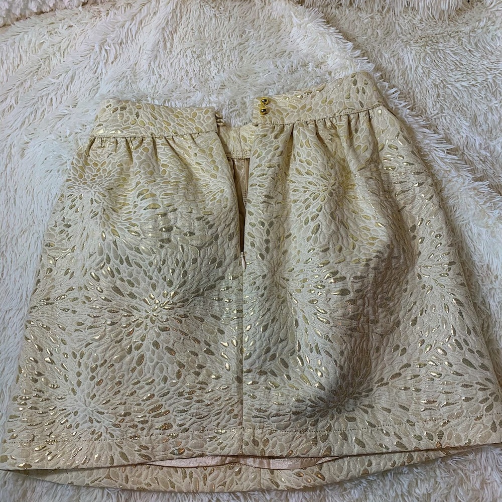 White and gold skirt